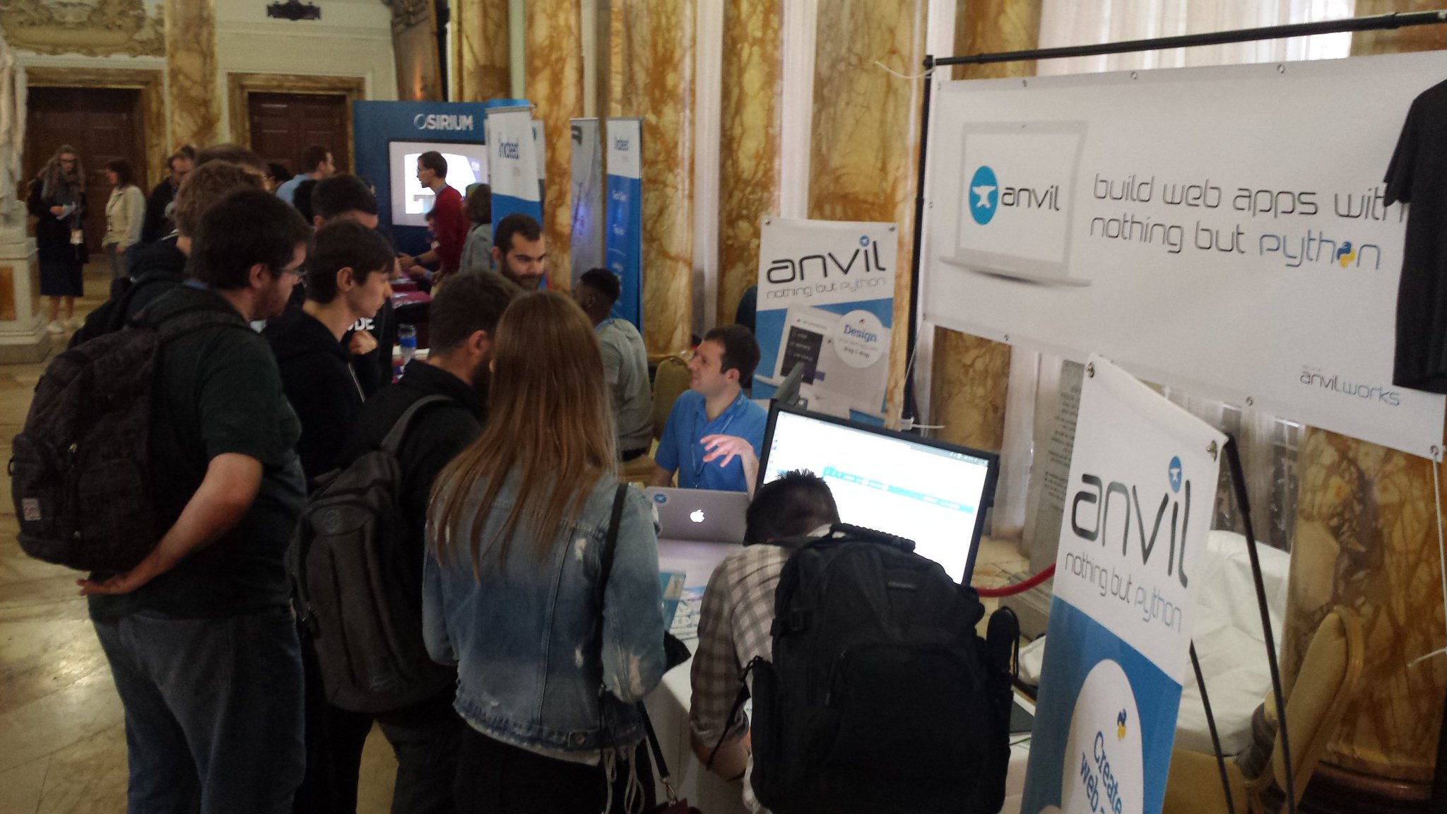 PyCon attendees flooding the Anvil stand. This is the only photo I got - mostly I was there, helping out!